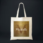 Sac fourre-tout Monogramme personnalisé, Parties s<br><div class="desc">Un riche arrière - plan d'or appliqué à la fausse parties scintillant d'or crée une atmosphère riche et presque antique pour ce sac fourre-tout. L'initiale de la femme est marron foncé pour fondre dans l'éclat doré. La parties scintillant d'or brille au-dessus. Le nom de la femme est au-dessus de celui-ci...</div>