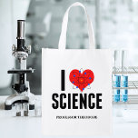 Sac Réutilisable I Love Science Scientifique Personnalisé Modèle At<br><div class="desc">Cute I Love Science sac d'épicerie réutilisable customisé avec votre nom. Dispose d'un modèle atome devant le coeur. Un cadeau geek parfait pour un professeur de sciences.</div>