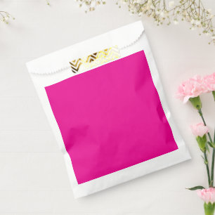 Sachets En Papier un arrière - plan rose avec un