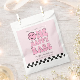 Sachets En Papier Un Bébé heureux, joyeux visage rose