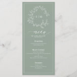 Sage Green Crest Monogram Mariage Menu<br><div class="desc">Créez le cadre de réception parfait ! Nous aimons ce menu mariage de 4"x 9" vert sauge moderne et tendance ! Simple, élégant et oh-so-joli, il présente une couronne feuilletée dessinée à la main encerclant un monogramme mariage moderne. Il est personnalisé en typographie élégante, et accentué par la calligraphie lettrée...</div>