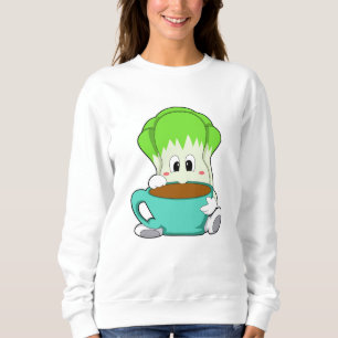 Salad met beker koffie trui