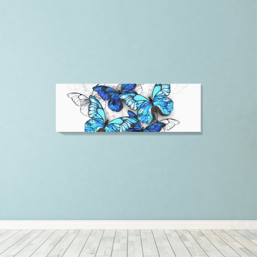 Samenstelling van witte en blauwe vlinders canvas afdruk (Insitu (Houten vloer))