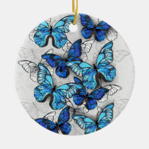 Samenstelling van witte en blauwe vlinders keramisch ornament
