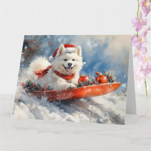 Samoyed hond in slee Laat het sneeuwen Kerstmis Kaart