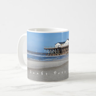 Sankt Peter Ording House op foto met tekst Koffiemok
