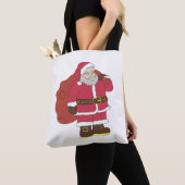 Santa Claus en rouge avec sac cadeau et lunettes (De près)