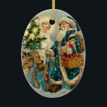Santa Claus vintage en ornements bleus<br><div class="desc">Père Noël vintage en manteau bleu. Ancien décor de Noël de mode ! Belles décorations de Noël victoriennes pour vos décorations de vacances ! Facile à customiser !</div>