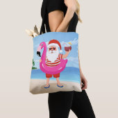 Santa Claus with flamingo inflatable ring Draagtas (Dichtbij)
