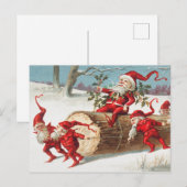 Santa gnomen die op een logboek glijden briefkaart (Voorkant / Achterkant)