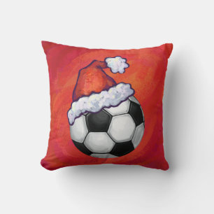 Santa Hat-Voetbal op rood Kussen