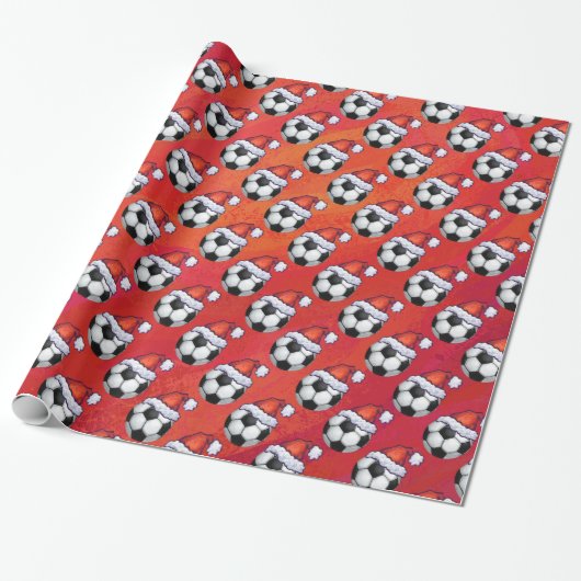 Santa Hat Voetbal Pattern op Red Cadeaupapier (Uitgerold)
