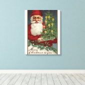 Santa Holding Candlelit Tree Canvas Afdruk (Insitu (Houten vloer))