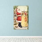 Santa Holding een overstromende tas van speelgoed Canvas Afdruk (Insitu (Houten vloer))