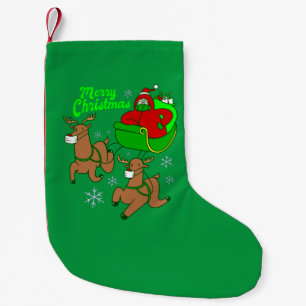 santa reinreder slee kleine kerstsok