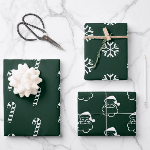 Santa-snowflakken voor kerstdonkergroene snoepriet inpakpapier vel