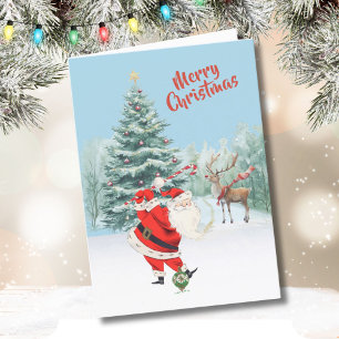Santa speelt golf met zijn rendier wacht kaart
