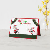 Santas jouant au football carte de Noël (Fleur jaune)