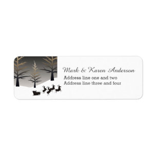 Santa's slee en boom silhouet etiket