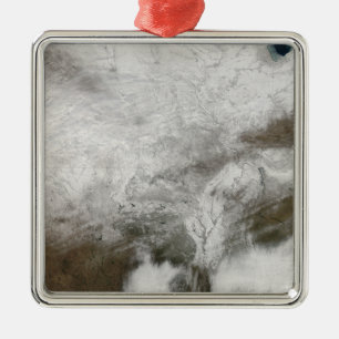 Satellietuitzicht van een zwaar winterstorm metalen ornament