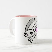Sautent à cloche-pied le lapin avec la tasse (Devant gauche)