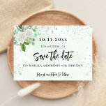 Save The Date Fête d'anniversaire floral blanc vert élégant<br><div class="desc">Une petite fille et tendance Enregistrer la carte Date pour une fête d'anniversaire de 40e (ou tout âge). Un élégant arrière - plan blanc et vert aquarellé décoré avec des étincelles de parties scintillant en faux argent, des fleurs blanches et de la verdure. Personnalisez et ajoutez une date et un...</div>