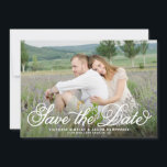 Save The Date White Rustic Whimsical Script Floral Photo<br><div class="desc">Annoncez votre date de mariage à votre famille et à vos amis avec cette photo enregistrer la carte de date. Il dispose d'un script lunatique rustique. Personnalisez en ajoutant votre photo fiançailles préférée, les noms, la date, le lieu et d'autres détails. Ce script enregistre la carte date sera parfait pour...</div>