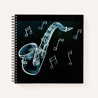 Saxofoon en muzieknoten notitieboek