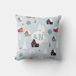 Scandinavisch dorp in folk art stijl met monogram kussen