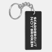 Scarred maar niet Broken Sleutelhanger Black (Voorkant Links)