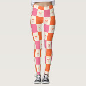 Schaakbordschedels in roze, Sinaasappel en crème Leggings (Voorkant)
