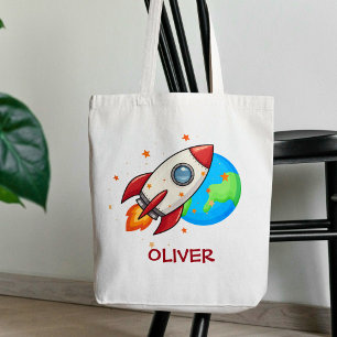 Schattelijke rode raket in de ruimte tote bag