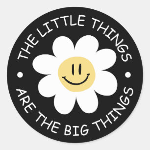 schattig bloemengezicht met motivatiequote ronde sticker
