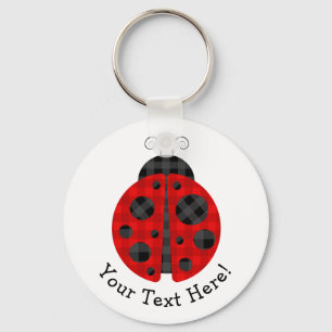 Schattig gerangschikt vlakladybug grafisch pictogr sleutelhanger