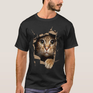 Schattig katje kijkt uit gescheurde stof Katten T-shirt