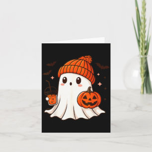 Schattig spookje met muts die pompoenkoffie vastho kaart