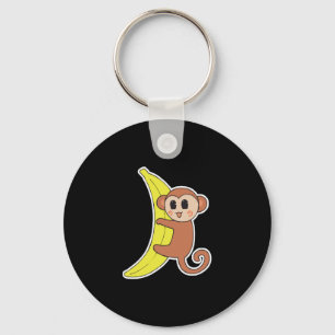 schattige babyaap op banaan sleutelhanger