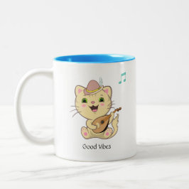 Schattige blije muzikale kaneelkleurige tabby kat  tweekleurige koffiemok