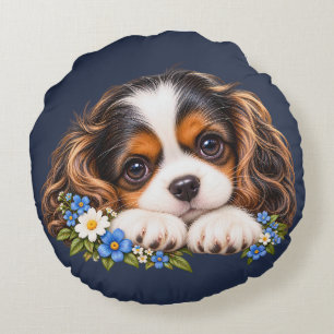 Schattige Cavalier King Charles Spaniel Puppy met  Rond Kussen