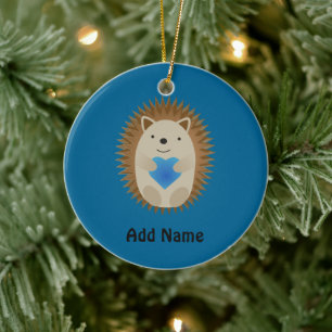 Schattige egel die een blauw hart knuffelt keramisch ornament