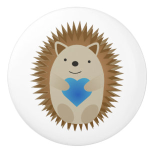 Schattige egel die een blauw hart knuffelt keramische knop
