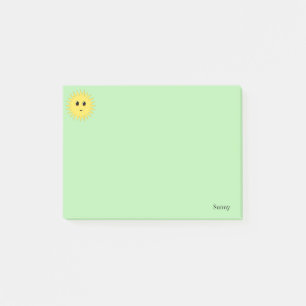 Schattige gelukkige zon op een lichtgroene achterg post-it® notes