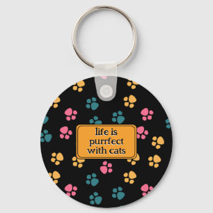 Schattige grappige zwarte kat poot sleutelhanger
