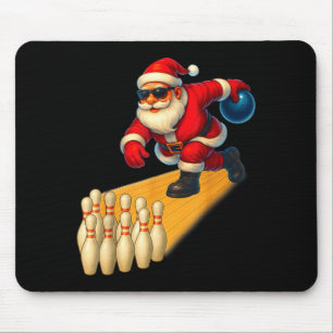 Schattige Kerstman speelt met bowlingbal en NS-bow Muismat