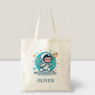 Schattige kleine astronaut op de maan tote bag