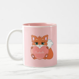 Schattige kleine vos die een hart vasthoudt op roz tweekleurige koffiemok