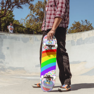 Schattige pinguïns en regenboogskateboard skateboard