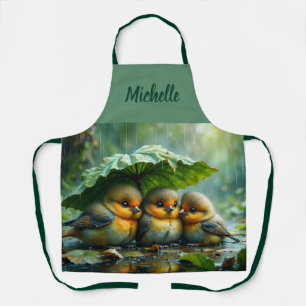 Schattige pluizige vogels die zich onder een blad  schort