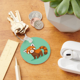 Schattige rode panda op groen sleutelhanger