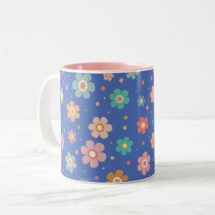 Schattige veelkleurig bloemmotief op blauw tweekleurige koffiemok